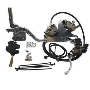 Tuttio Ultra Bee foot brake kit laid out with foot lever, dual caliper mount, hand lever, master cylinders and hardware